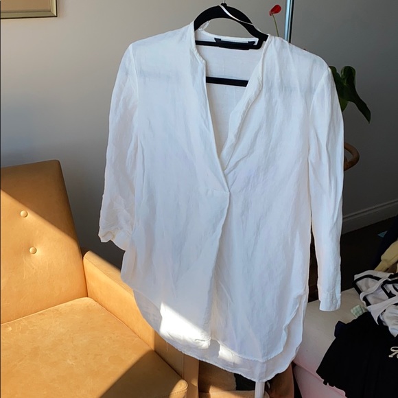 White flowy linen blouse